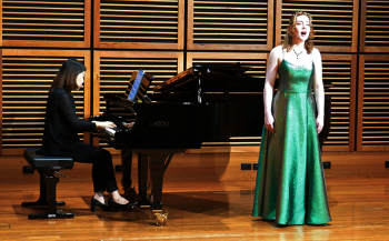 In recital. Leah Bell performing in a recital.