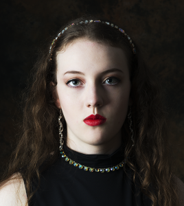 Chiaroscuro. Leah Bell in an atmospheric studio portrait with chiaroscuro lighting.