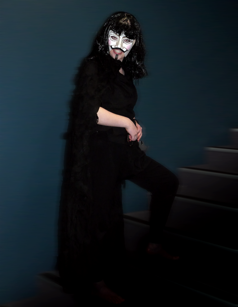 Leah Bell as V, pre-performance. Leah Bell dressed as V before a performance.